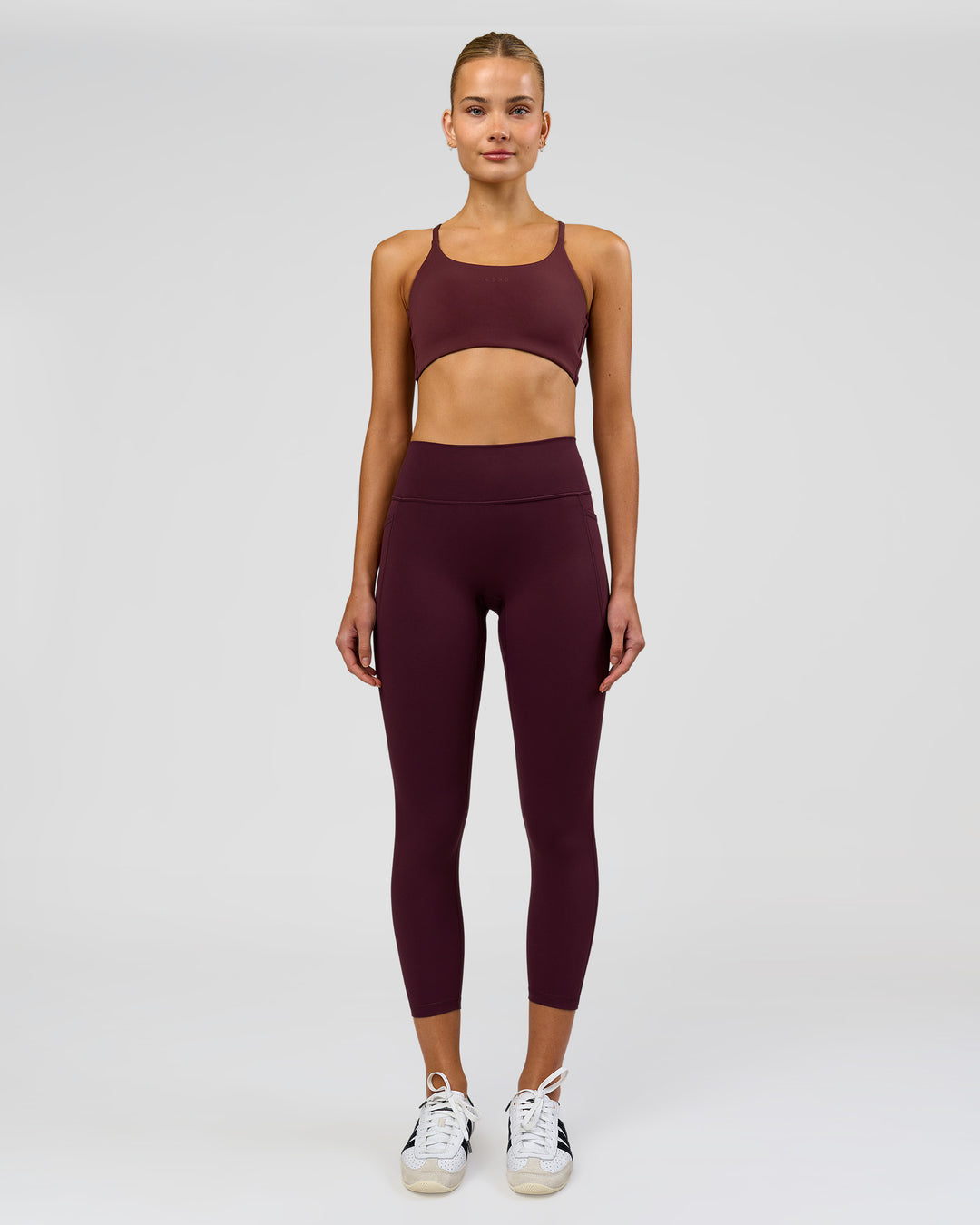 Woman wearing Fusion High-Rise 7/8 Legging Pockets - Cherry Lacquer | Model:Taneisha | Size:XS - view 4
