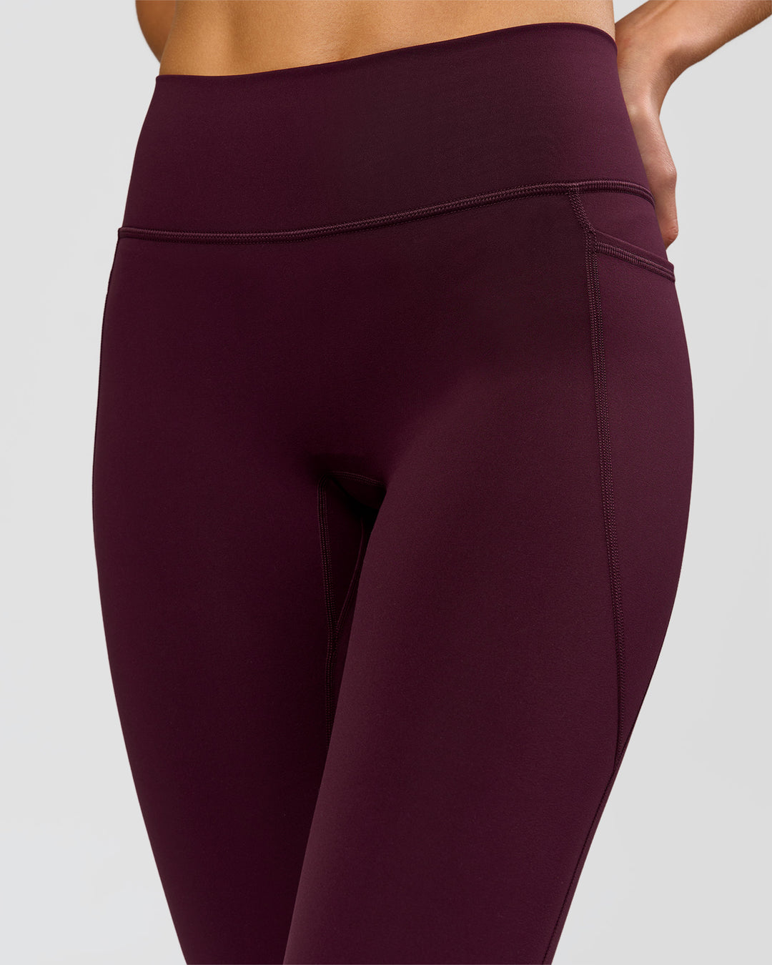 Woman wearing Fusion High-Rise 7/8 Legging Pockets - Cherry Lacquer | Model:Taneisha | Size:XS - view 8