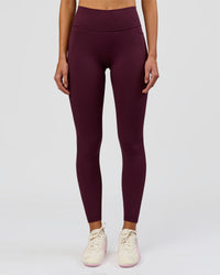 Woman wearing Fusion High-Rise Full Length Legging Pockets - Cherry Lacquer | Model:Taneisha | Size:XS | Thumbnail Index: 1