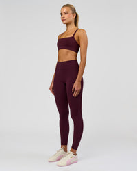 Woman wearing Fusion High-Rise Full Length Legging Pockets - Cherry Lacquer | Model:Taneisha | Size:XS | Thumbnail Index: 2