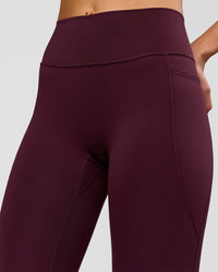 Woman wearing Fusion High-Rise Full Length Legging Pockets - Cherry Lacquer | Model:Taneisha | Size:XS | Thumbnail Index: 3