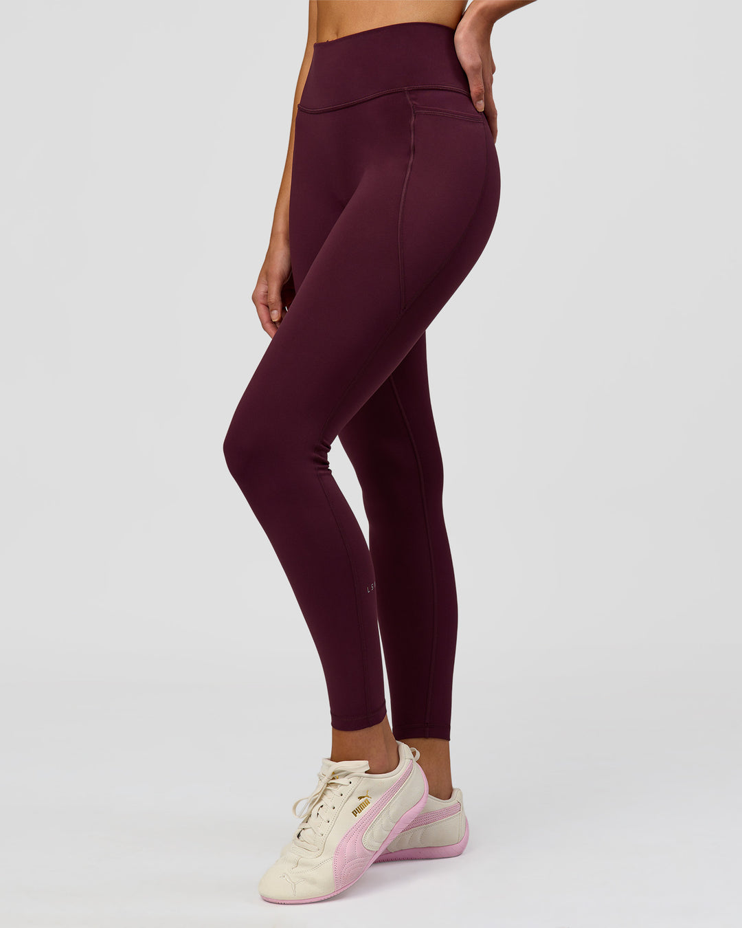 Woman wearing Fusion High-Rise Full Length Legging Pockets - Cherry Lacquer | Model:Taneisha | Size:XS - view 7