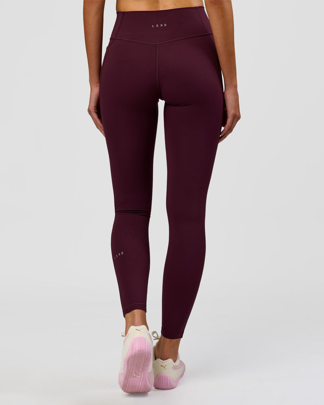 Woman wearing Fusion High-Rise Full Length Legging Pockets - Cherry Lacquer | Model:Taneisha | Size:XS - view 8