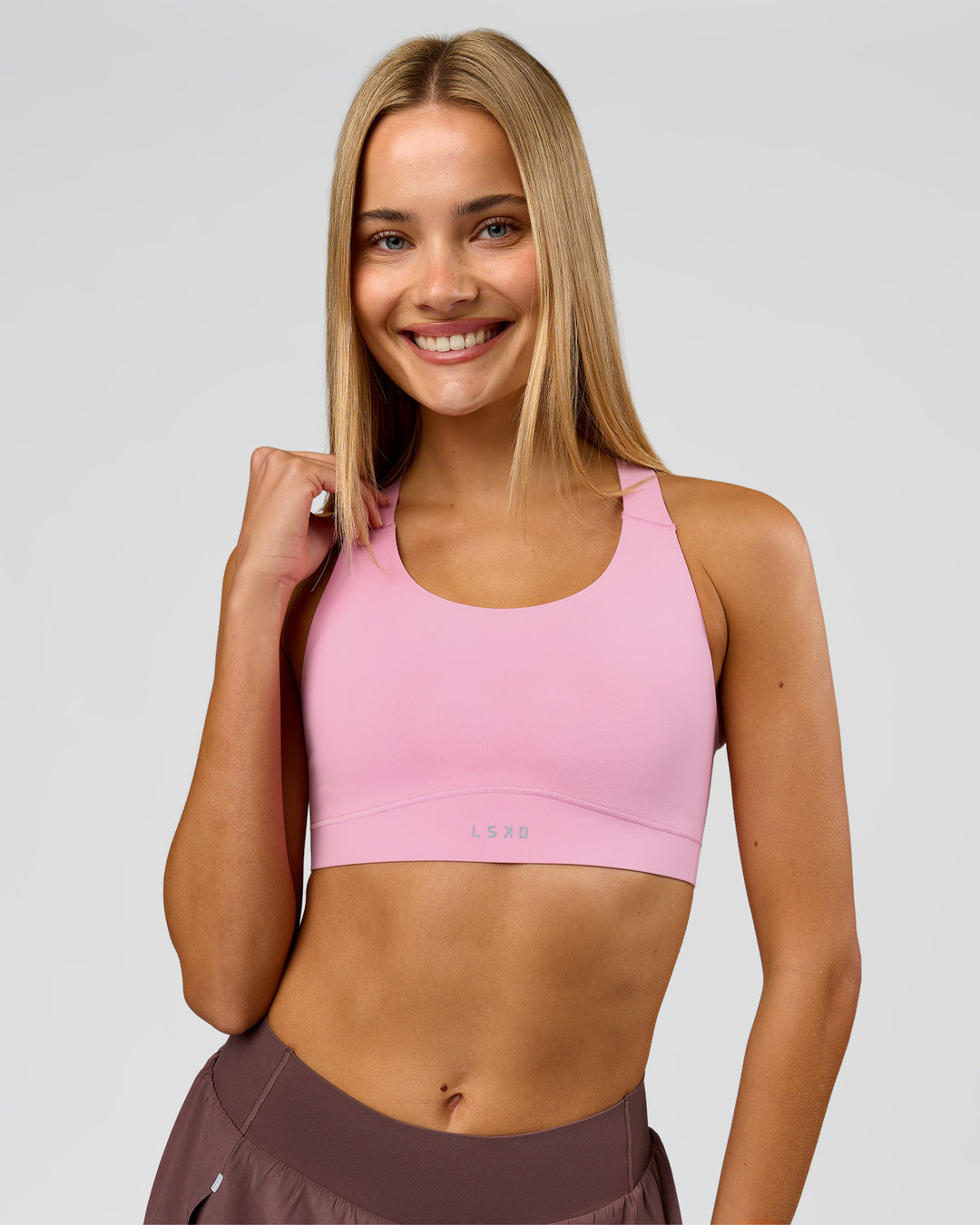 Woman wearing Fusion Sports Bra 2.0 - Pink Rose | Model:Taneisha | Size:XS - view 2