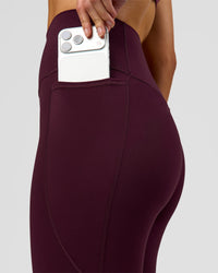 Woman wearing Fusion Ultra High-Rise 3/4 Legging Pockets - Cherry Lacquer | Model:Taneisha | Size:XS | Thumbnail Index: 3