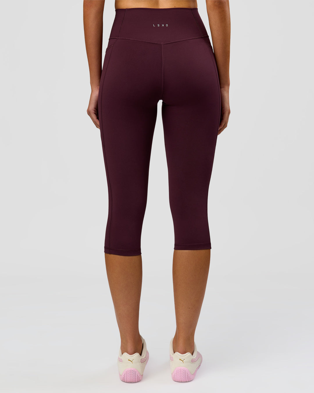 Woman wearing Fusion Ultra High-Rise 3/4 Legging Pockets - Cherry Lacquer | Model:Taneisha | Size:XS - view 6