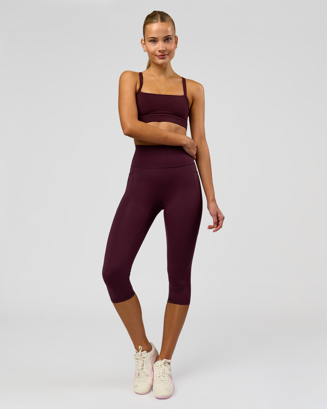 Woman wearing Fusion Ultra High-Rise 3/4 Legging Pockets - Cherry Lacquer | Model:Taneisha | Size:XS - view 7