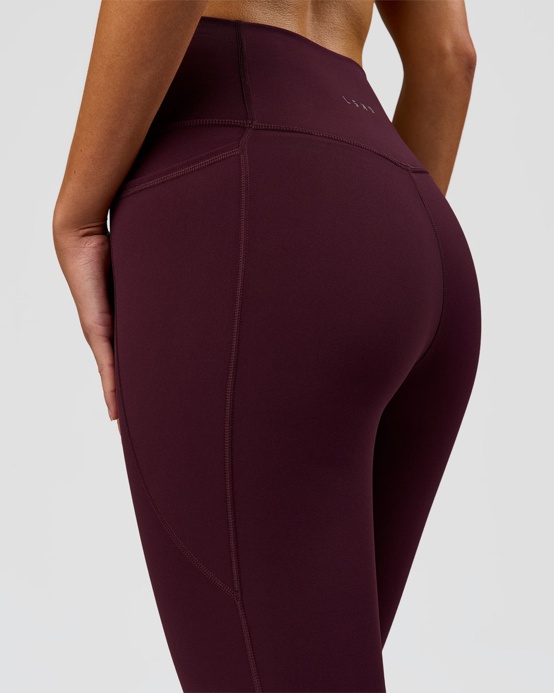 Woman wearing Fusion Ultra High-Rise 3/4 Legging Pockets - Cherry Lacquer | Model:Taneisha | Size:XS - view 8