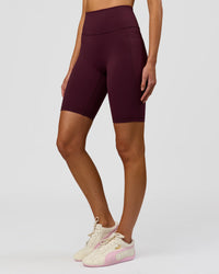 Woman wearing Fusion Ultra High-Rise 9" Short Pockets - Cherry Lacquer | Model:Taneisha | Size:XS | Thumbnail Index: 1