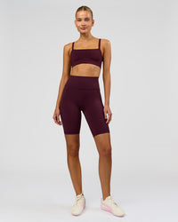 Woman wearing Fusion Ultra High-Rise 9" Short Pockets - Cherry Lacquer | Model:Taneisha | Size:XS | Thumbnail Index: 5