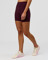 Woman wearing Fusion V-Contour Ultra High-Rise 6" Short Pockets - Cherry Lacquer | Model:Taneisha | Size:XS | Thumbnail Index: 5