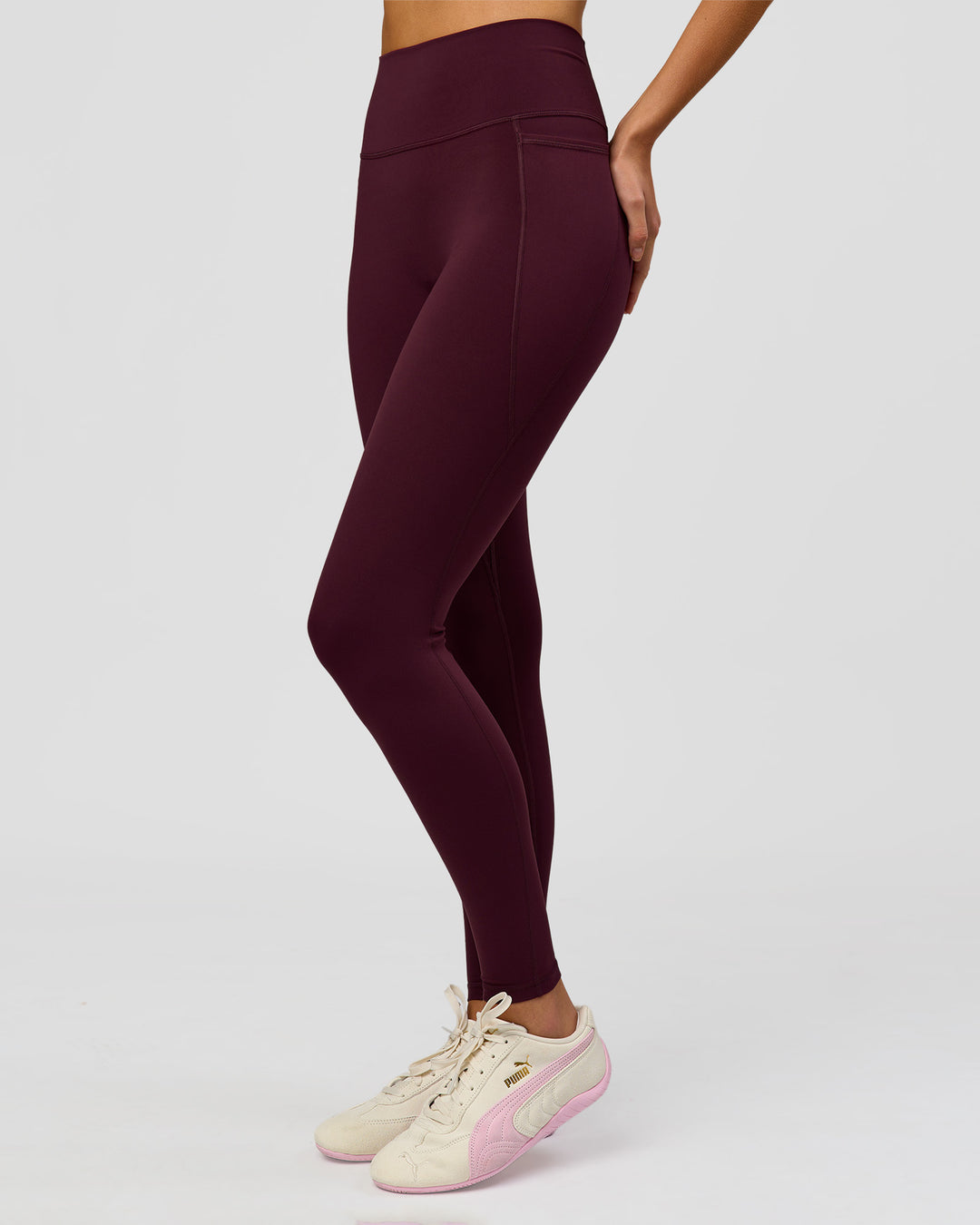 Woman wearing Fusion V-Contour Ultra High-Rise Full Length Legging Pockets - Cherry Lacquer | Model:Taneisha | Size:XS - view 5