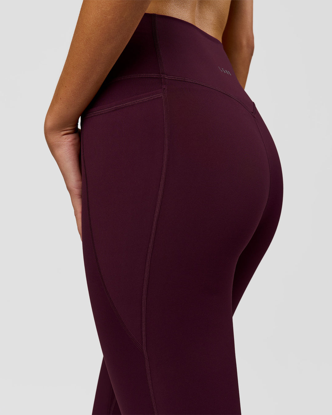Woman wearing Fusion V-Contour Ultra High-Rise Full Length Legging Pockets - Cherry Lacquer | Model:Taneisha | Size:XS - view 8