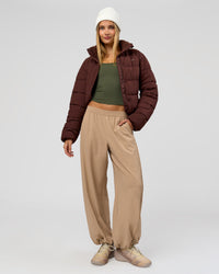 Woman wearing Go-To Puffer Jacket - Hot Chocolate | Model:Taneisha | Size:XS | Thumbnail Index: 4