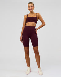 Woman wearing Rep Ultra High-Rise 9" Short Pockets - Cherry Lacquer-White | Model:Taneisha | Size:XS | Thumbnail Index: 2