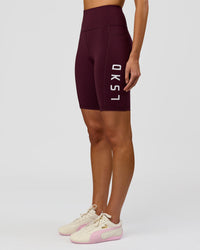 Woman wearing Rep Ultra High-Rise 9" Short Pockets - Cherry Lacquer-White | Model:Taneisha | Size:XS | Thumbnail Index: 4