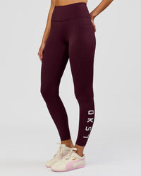 Woman wearing Rep Ultra High-Rise Full Length Legging Pockets - Cherry Lacquer-White | Model:Taneisha | Size:XS | Thumbnail Index: 3