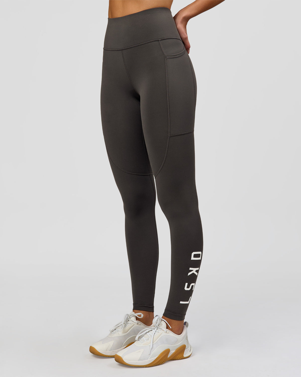 Woman wearing Rep Ultra High-Rise Full Length Legging Pockets - Onyx-white | Model:Taneisha | Size:XS