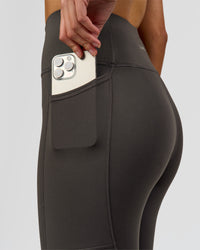 Woman wearing Rep Ultra High-Rise Full Length Legging Pockets - Onyx-white | Model:Taneisha | Size:XS | Thumbnail Index: 1