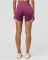 Woman wearing Revitalise Ultra High-Rise 6" Short - Boysenberry-Pink Rose | Model:Taneisha | Size:XS | Thumbnail Index: 8