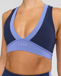 Woman wearing Stamina Layered Sports Bra - Future Navy-Bluebell | Model:Taneisha | Size:XS | Thumbnail Index: 4