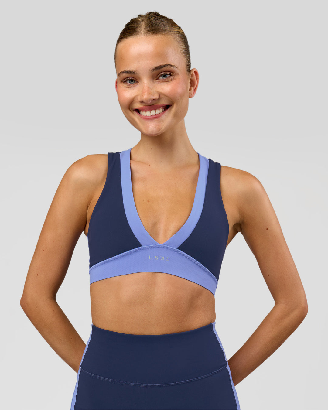 Woman wearing Stamina Layered Sports Bra - Future Navy-Bluebell | Model:Taneisha | Size:XS - view 6