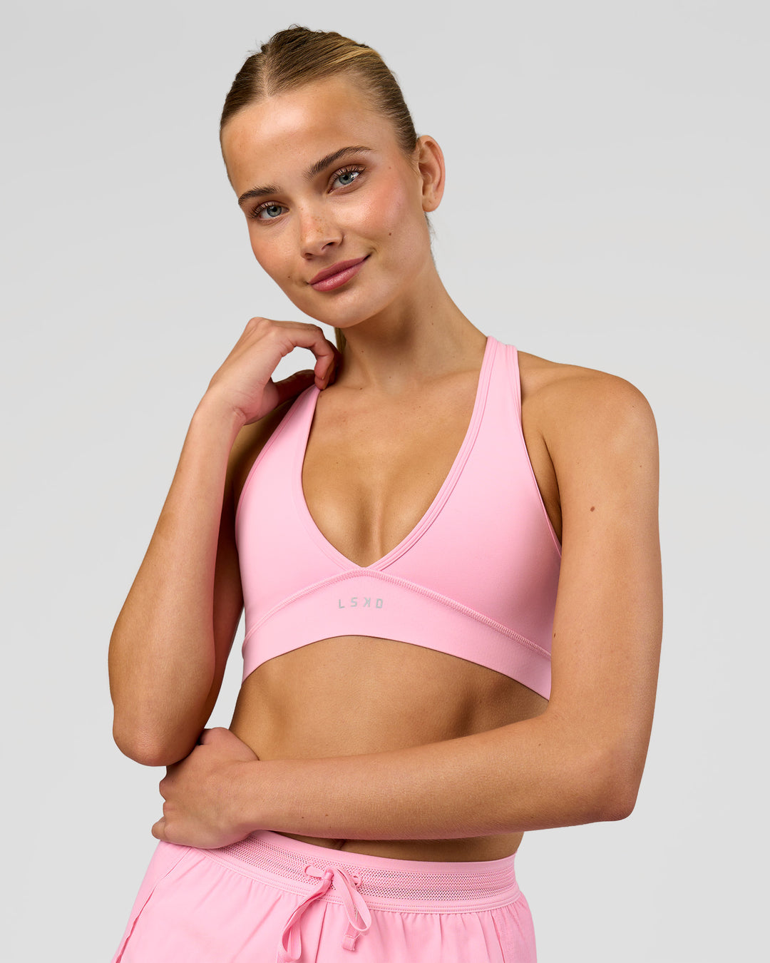 Woman wearing Stamina Sports Bra - Pink Rose | Model:Taneisha | Size:XS - view 5
