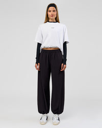 Woman wearing Stitch Up Track Pant - Black | Model:Taneisha | Size:XS | Thumbnail Index: 5
