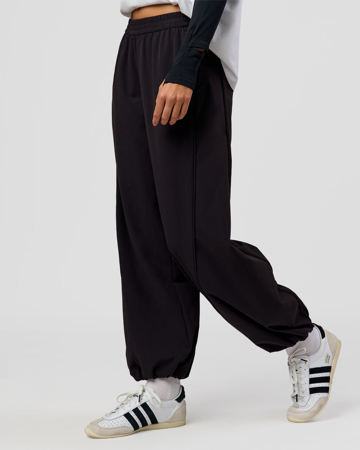 Woman wearing Stitch Up Track Pant - Black | Model:Taneisha | Size:XS