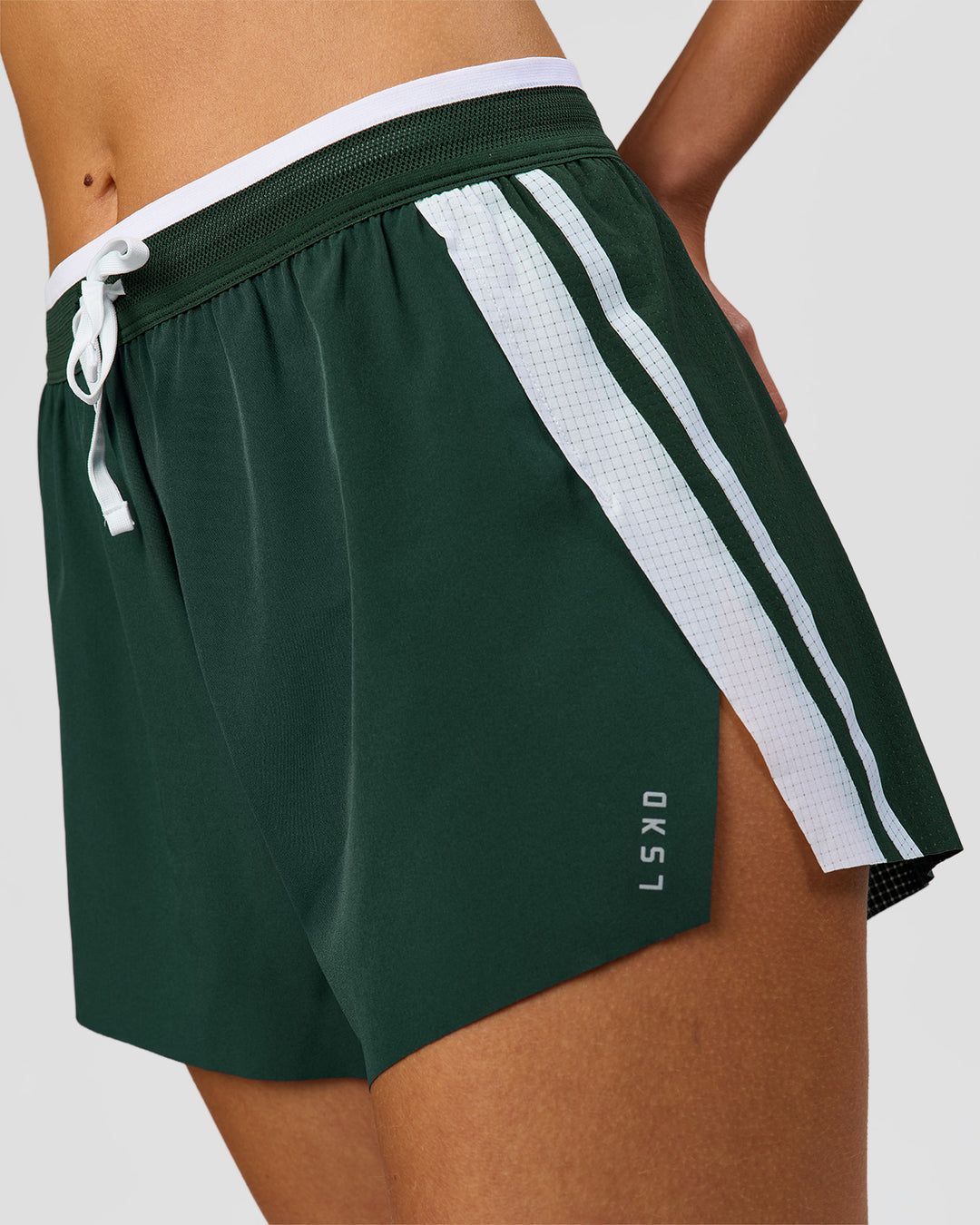 Woman wearing Trackline Accelerate 3" High-Rise Running Short - Midnight Green-White | Model:Taneisha | Size:XS - view 5
