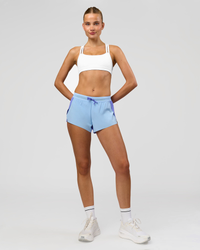 Woman wearing Velocity Sports Bra - White | Model:Taneisha | Size:XS | Thumbnail Index: 4