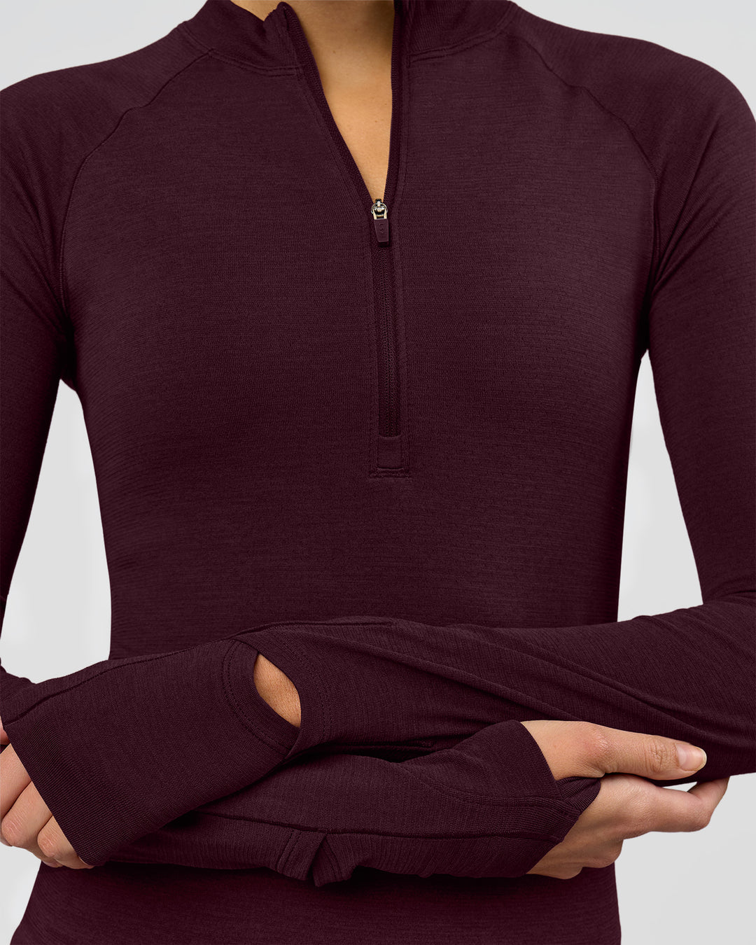 Woman wearing AeroFLX+ Long Sleeve Half Zip - Cherry Lacquer/Cherry Laquer | Model:Taniesha | Size:XS - view 3