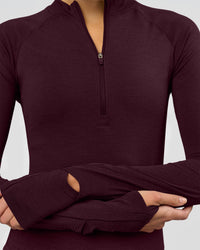 Woman wearing AeroFLX+ Long Sleeve Half Zip - Cherry Lacquer/Cherry Laquer | Model:Taniesha | Size:XS | Thumbnail Index: 2