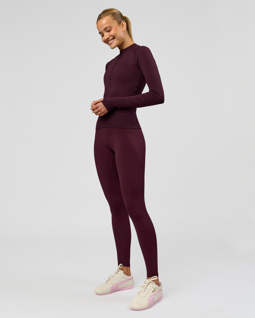 Woman wearing AeroFLX+ Long Sleeve Half Zip - Cherry Lacquer/Cherry Laquer | Model:Taniesha | Size:XS - view 4