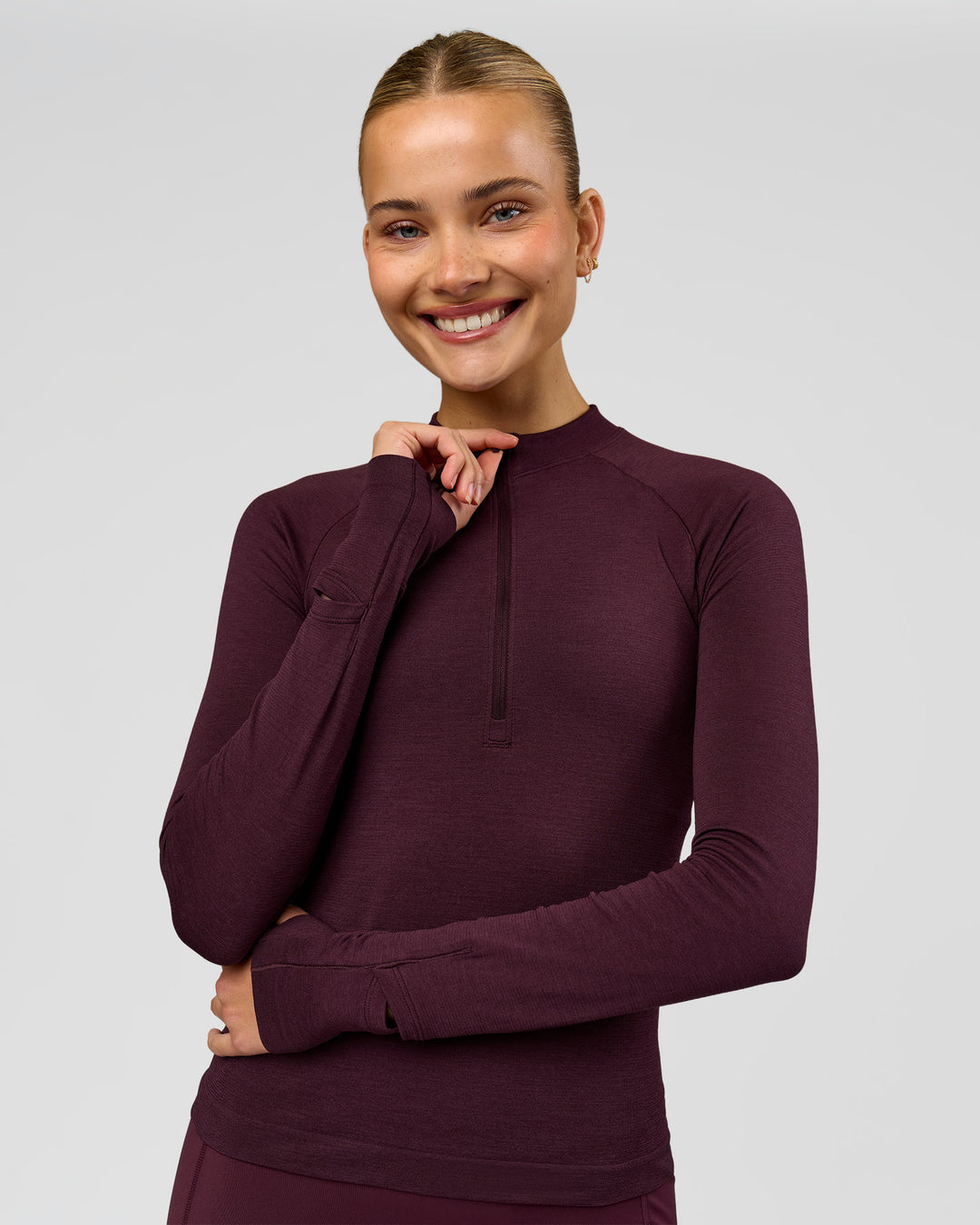Woman wearing AeroFLX+ Long Sleeve Half Zip - Cherry Lacquer/Cherry Laquer | Model:Taniesha | Size:XS - view 5