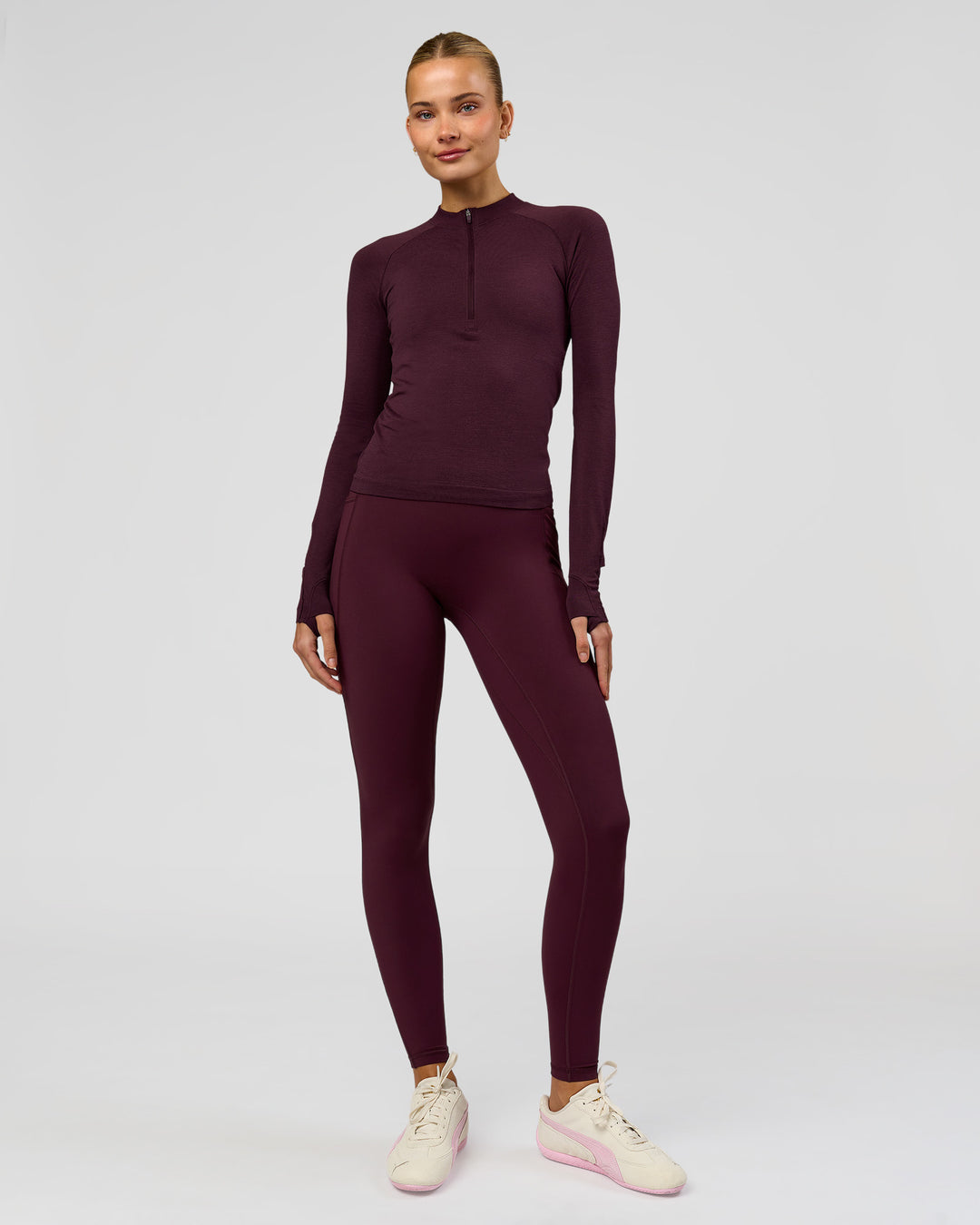 Woman wearing AeroFLX+ Long Sleeve Half Zip - Cherry Lacquer/Cherry Laquer | Model:Taniesha | Size:XS - view 9
