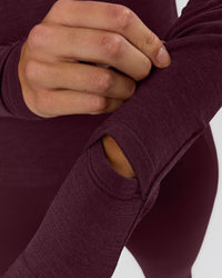 Woman wearing AeroFLX+ Long Sleeve Half Zip - Cherry Lacquer/Cherry Laquer | Model:Taniesha | Size:XS | Thumbnail Index: 10