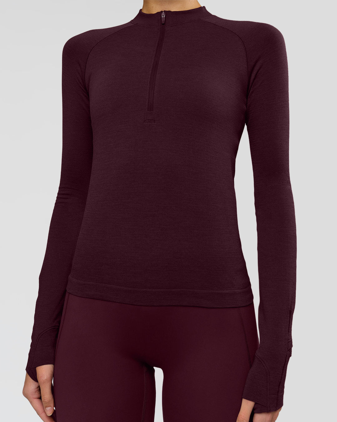 Woman wearing AeroFLX+ Long Sleeve Half Zip - Cherry Lacquer/Cherry Laquer | Model:Taniesha | Size:XS - view 12