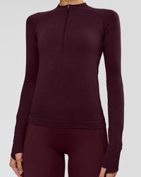 Woman wearing AeroFLX+ Long Sleeve Half Zip - Cherry Lacquer/Cherry Laquer | Model:Taniesha | Size:XS | Thumbnail Index: 11
