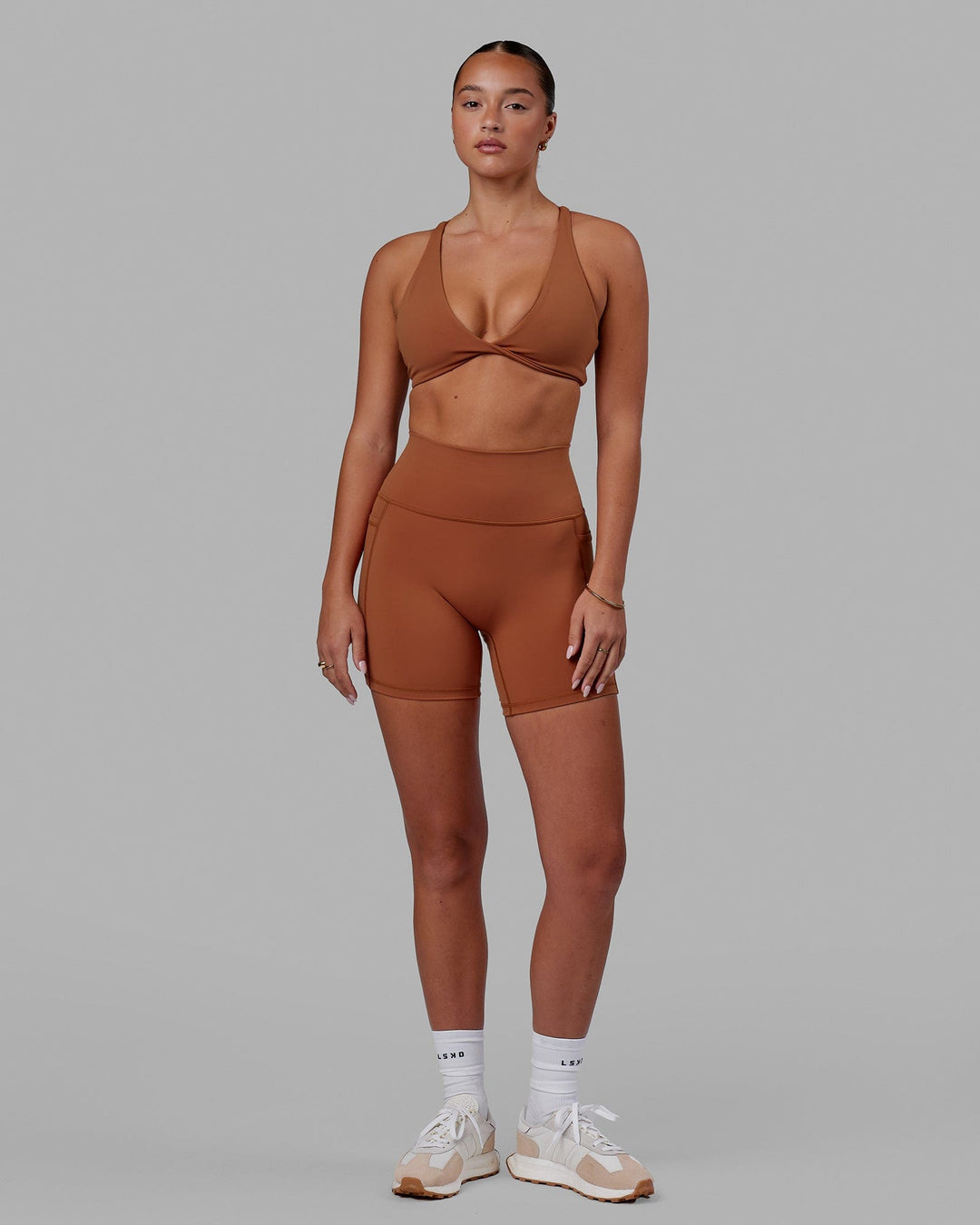 Woman wearing Fusion Ultra High-Rise 6" Short Pockets - Hazel | Model:Milly | Size:S - view 3