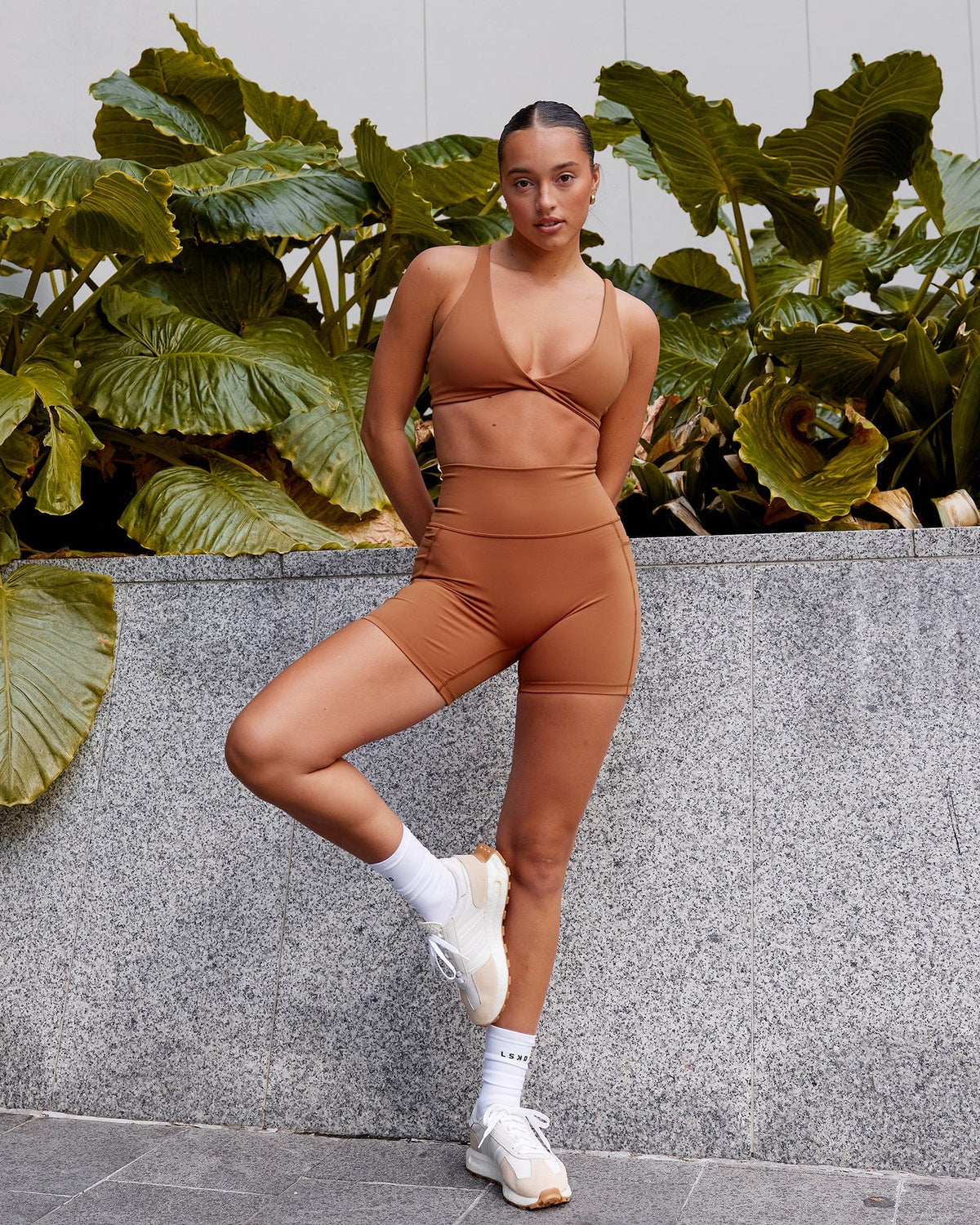 Woman wearing Fusion Ultra High-Rise 6" Short Pockets - Hazel | Model:Milly | Size:S