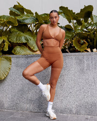 Woman wearing Fusion Ultra High-Rise 6" Short Pockets - Hazel | Model:Milly | Size:S | Thumbnail Index: 1