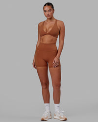 Woman wearing Fusion Ultra High-Rise 4" Short Pockets - Hazel | Model:Milly | Size:S | Thumbnail Index: 6