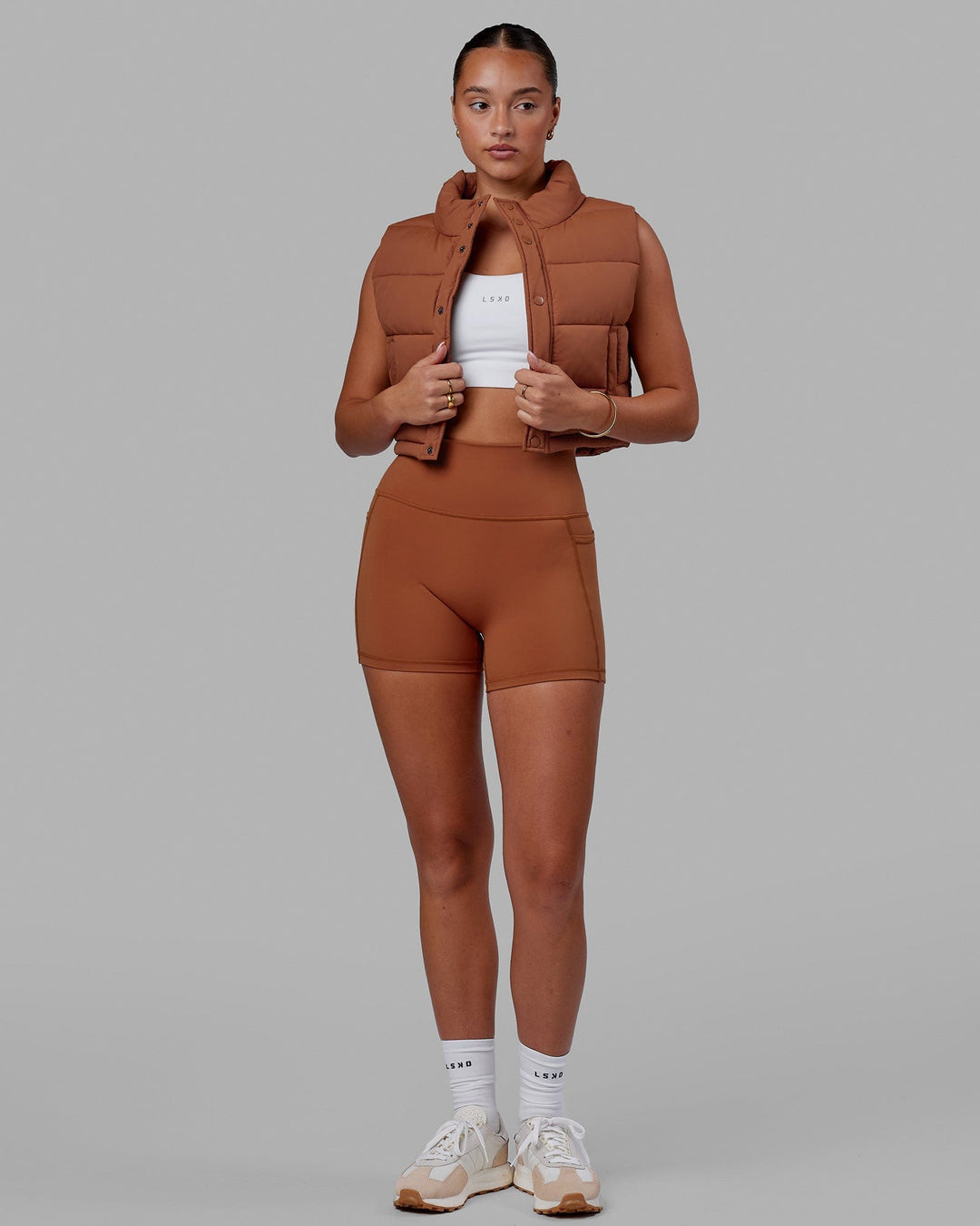 Woman wearing Fusion Ultra High-Rise 4" Short Pockets - Hazel | Model:Milly | Size:S - view 8