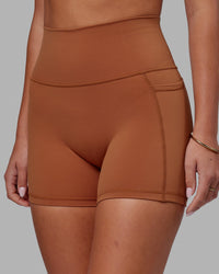 Woman wearing Fusion Ultra High-Rise 4" Short Pockets - Hazel | Model:Milly | Size:S | Thumbnail Index: 8