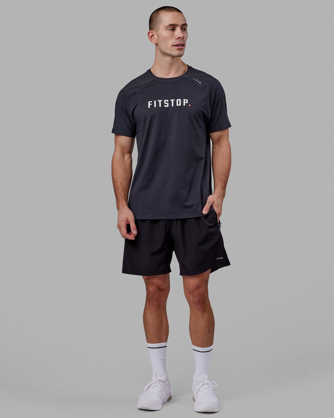 Man wearing LSKD x FS VapourFLX Trainer Tee - Black Marl - view 2