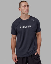 Man wearing LSKD x FS VapourFLX Trainer Tee - Black Marl | Thumbnail Index: 0