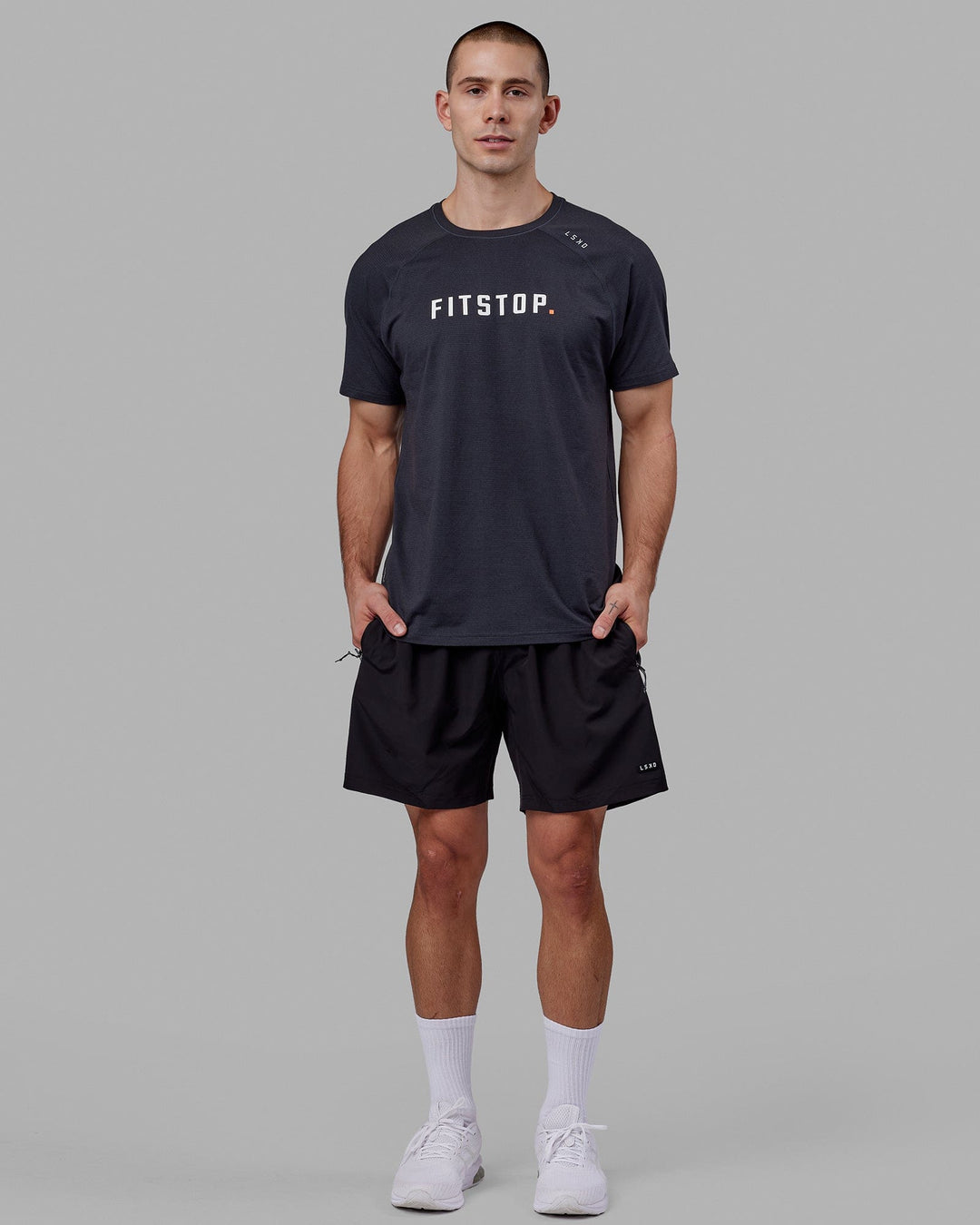 Man wearing LSKD x FS VapourFLX Trainer Tee - Black Marl - view 5