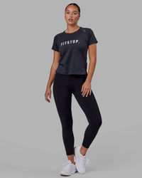Woman wearing LSKD x FS VapourFLX Trainer Tee - Black Marl | Thumbnail Index: 1