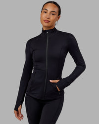 Woman wearing Stride Zip Through Jacket - Black | Thumbnail Index: 5